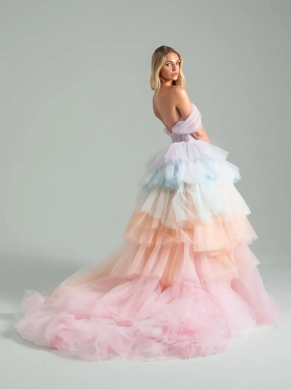 model is wearing the after the storm hayley paige wedding gown