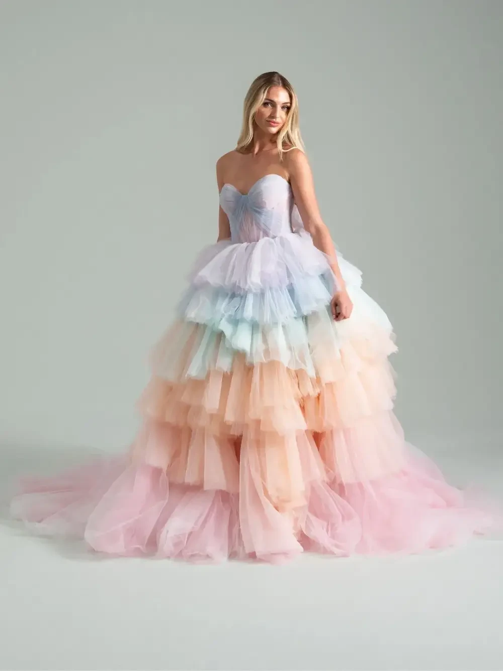 model is wearing the after the storm hayley paige wedding gown