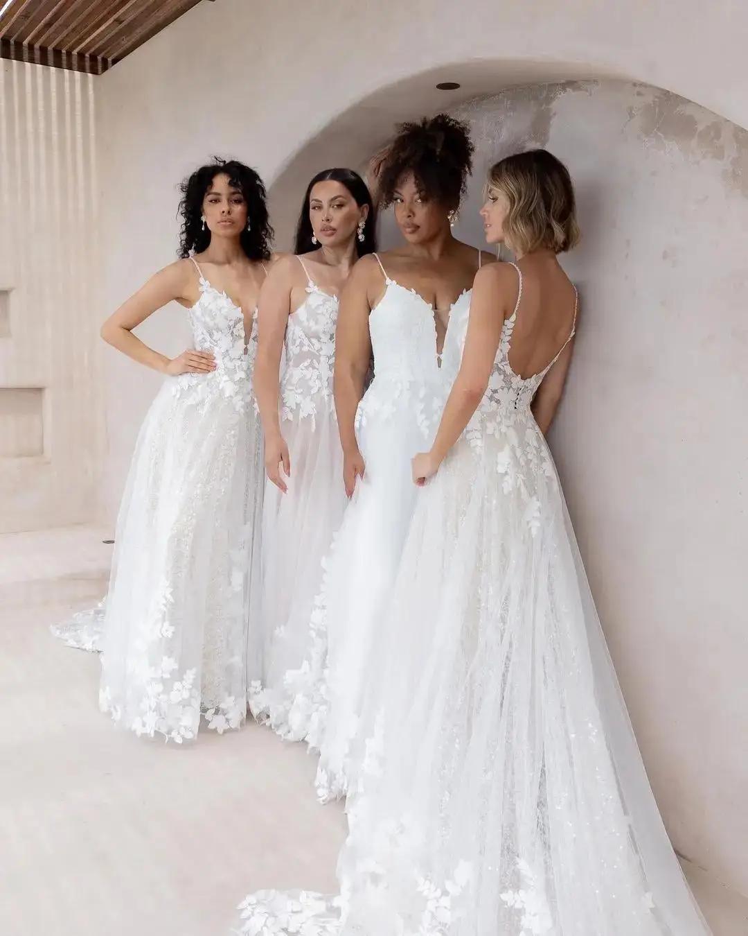 Models wearing different sizes of the same wedding dress