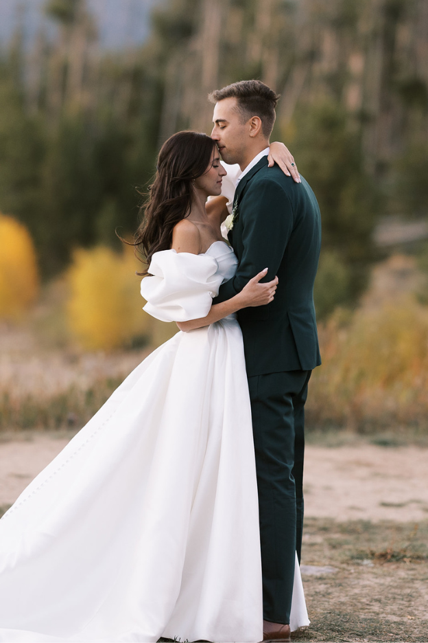 real bride wearing Exxon wedding dress by pronovias bridal designer
