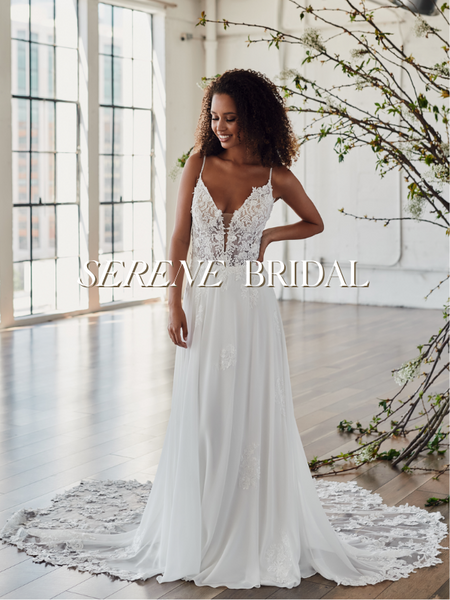 Model wearing a bridal gown by Serene Bridal